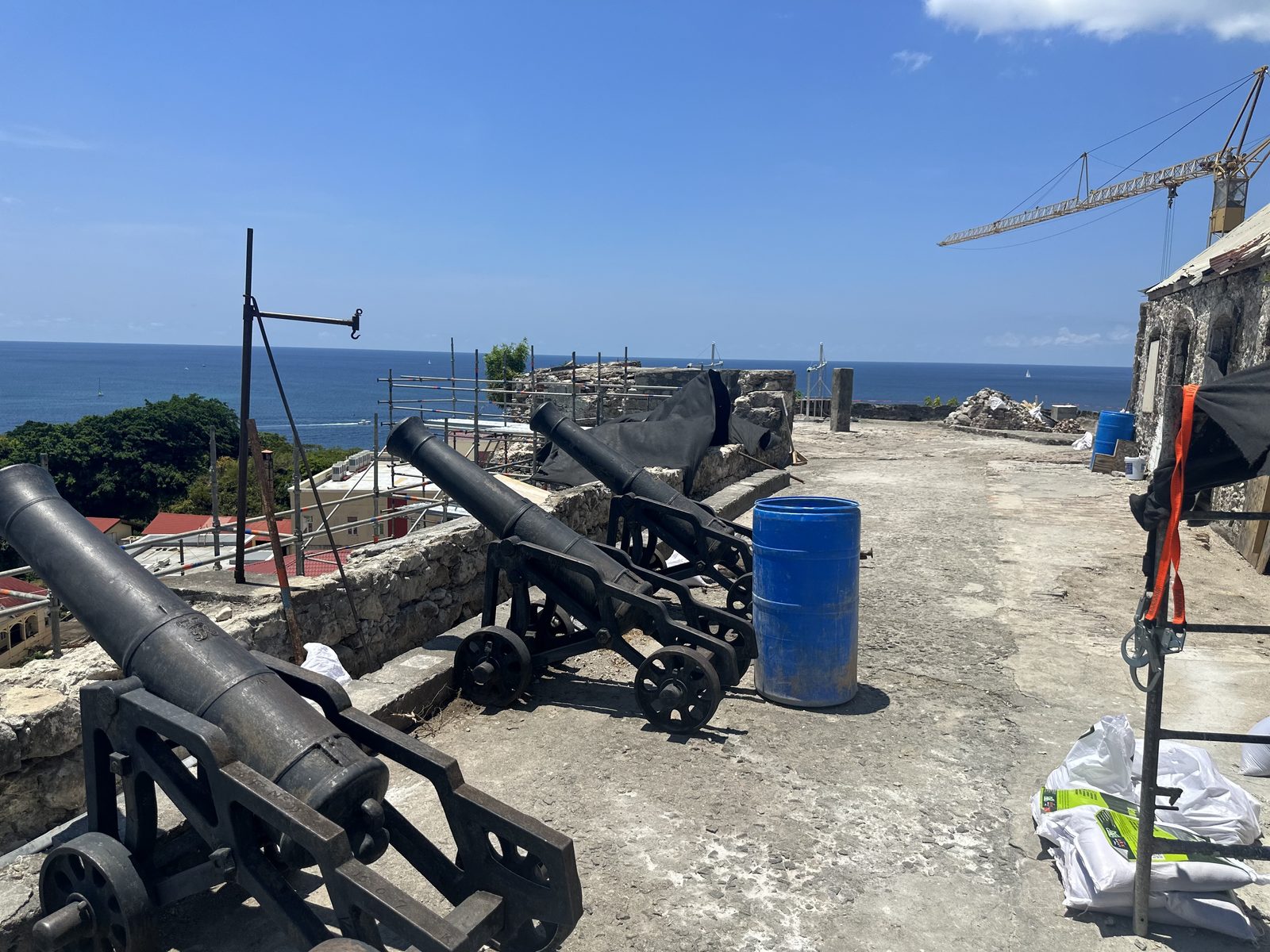 Historic cannons on the restored battery overlooking the Caribbean